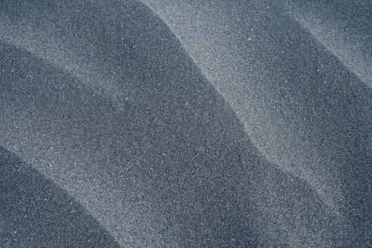 greay sand ripples close up