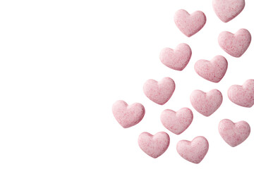 Soft pink hearts scattered on a clean transparent background with subtle shading and textures