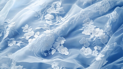 A blue and white lace fabric with flowers