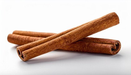 two brown vegeterian cinnamon sticks mendacity on white historical past