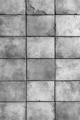 grainy concrete wall with square tiles, seamless texture background