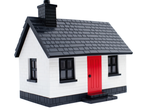 Isolated White and Black Toy House with Red Door
