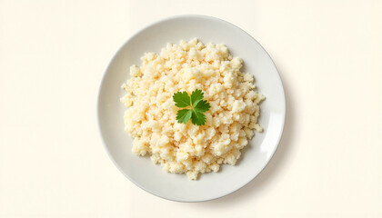 Cottage cheese with fresh parsley on white plate