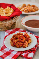 bbq shrimp served with tortilla chips