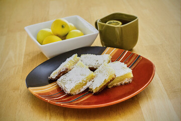 lemon bars topped with powdered sugar