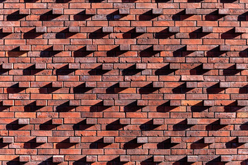 Texture background with many bricks and shadows.