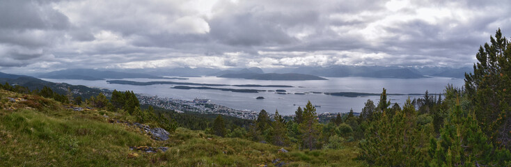 Fototapeta premium Varden viewpoint Panoramic landscapes, ocean, fjords, islands forests summer 2024 around Molde Norway Scandinavia Europe