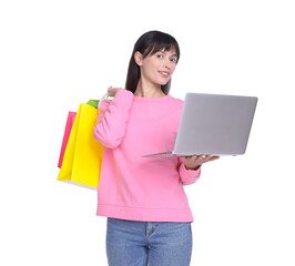 Fototapeta premium Internet shopping. Smiling woman with laptop and colorful bags on white background