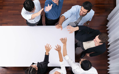 Panorama banner top view group of diverse office worker join hand over meeting table. Business...