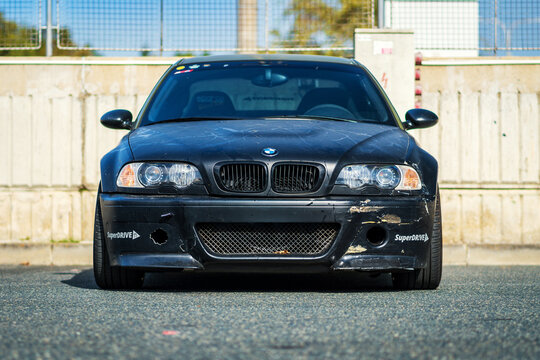 Old racing BMW M3 designed for drifting on a racing circuit. Worn-out BMW 3 series with the designation e46.