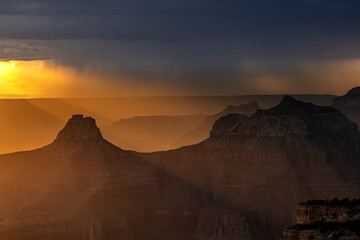 USA, Arizona, Grand Canyon National Park. Thunderstorm on North Rim at sunset.