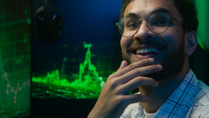 Thoughtful pensive Arabian Indian man thinking pondering solution programmer coder hacker worker cyberspace analysis male guy puzzled trader broker freelancer doubtful face online engineer developer