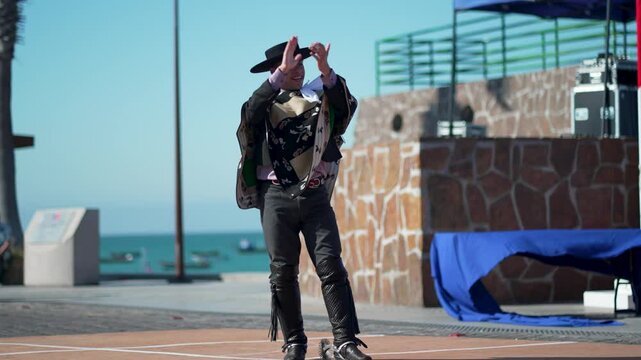 Energetic chilean dancers showcase traditional cueca moves, celebrating their heritage with vibrant costumes and handkerchiefs