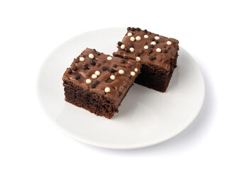 Chocolate brownie cake sprinkled with white and dark balls, classic birthday brownie square piece