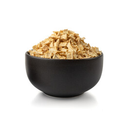 Dry parsley root, dried diced celery cubes, scattered small liquorice pileces, dry vegetable