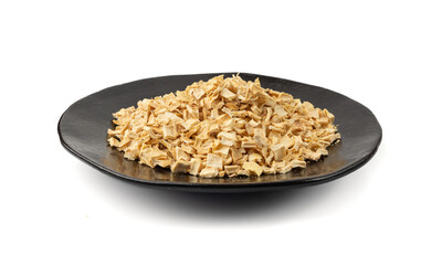 Dry parsley root, dried diced celery cubes, scattered small liquorice pileces, dry vegetable