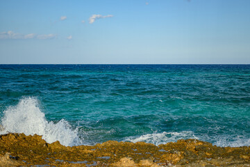 Ocean Waves Crashing on the Rocky Shore