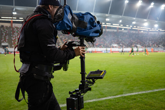 TV camera on the stabilizer at football stadium