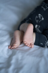 baby feet in bed