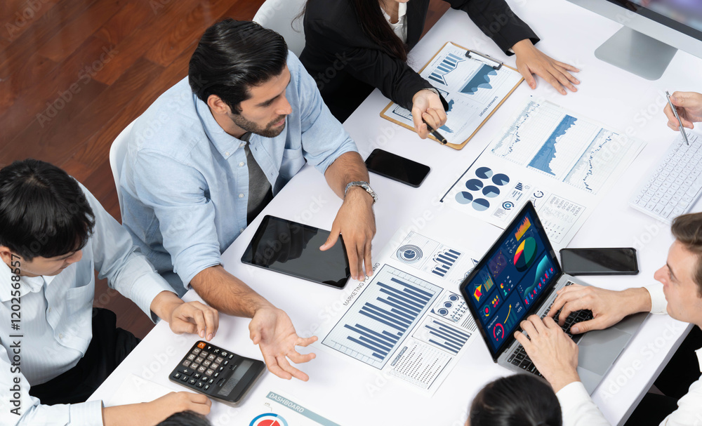 Leinwandbilder Analyst team utilizing BI Fintech to analyze financial data at table in meeting room. Businesspeople analyzing BI dashboard power on paper for business insight and strategic marketing planning.Prudent