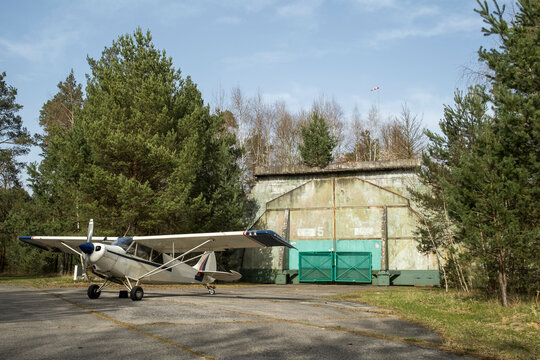 Soviet 2A13 Aircraft Shelter with an Aviat Husky parked in front of it