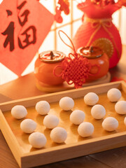 sweet dumping or tangyuan traditional Chinese new year food .(the Chinese characters means New Year's blessing）