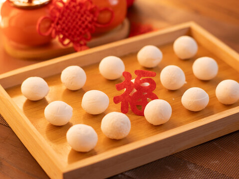 sweet dumping or tangyuan traditional Chinese new year food .(the Chinese characters means New Year's blessing）