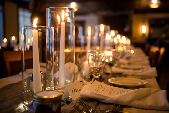 Elegant candlelit banquet hall decorated for a wedding reception