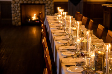 Elegant candlelit banquet hall decorated for a wedding reception