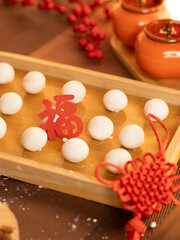 sweet dumping or tangyuan traditional Chinese new year food .(the Chinese characters means New Year's blessing）
