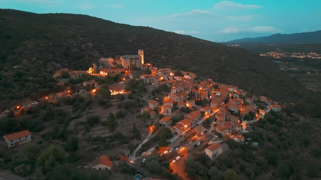 Aerial view of Eus, the medieval hilltop town in Pyrenees mountains, France. 