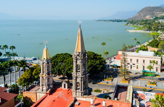 Chapala church towers overlooking the lake and boardwalk in Jalisco, Mexico