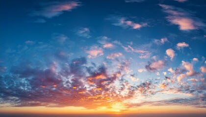 Obraz premium real majestic sunrise sundown sky background with gentle colorful clouds without birds