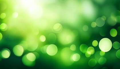 Obraz premium green abstract bokeh background featuring a soft blur effect with shades of emerald and lime colors