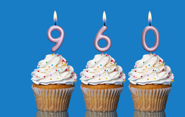 Birthday Cupcakes With Candles Lit Forming The Number 960