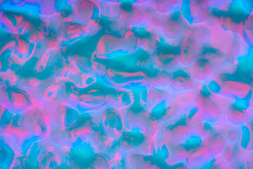 Dynamic abstract design with vibrant neon and fluid shapes.