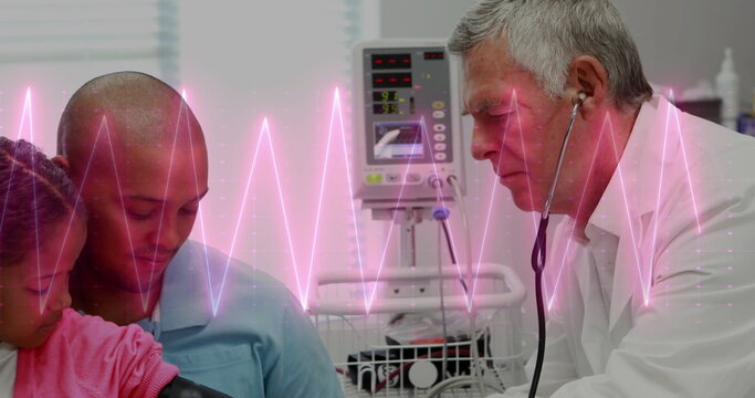 Image of cardiograph over caucasian male doctor examining his patient