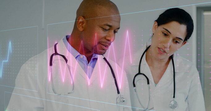 Image of cardiograph over diverse doctors holding clipboard