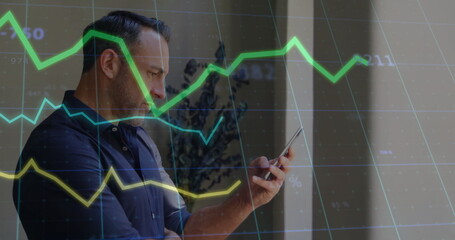 Image of data processing and diagrams over caucasian man using smartphone