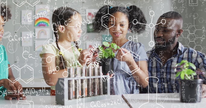 Image of chemical equations over african american male teacher with diverse schoolchildren
