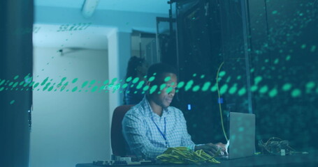 Image of financial data processing over african american colleagues working in server room