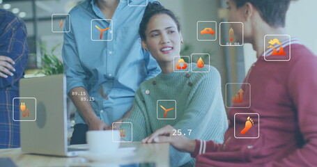 Image of eco icons and data processing over diverse business people in office
