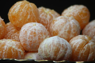 Tangerines without peel Close Up