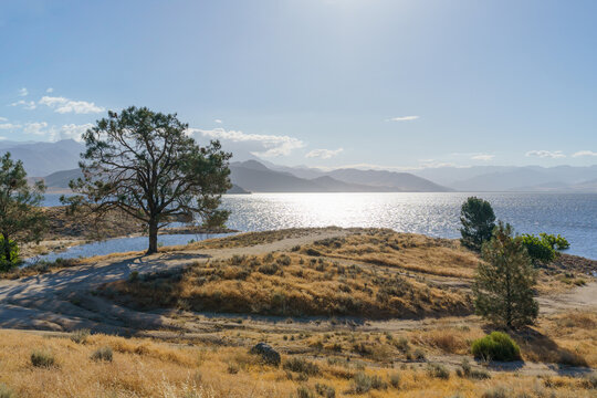 Isabella Lake Reservoir with sunlight on water in Sequoia National Forest, California, Kern County