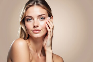 A Beautiful Young Woman with Flawless Skin Posing for a Portrait Against a Neutral Beige Background, Highlighting Natural Beauty and Grace