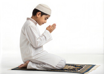 Fototapeta premium Young Muslim Boy Praying