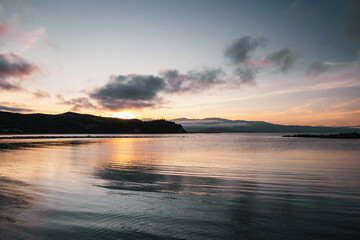 Obraz premium A beautifully calm sunset by the sea.