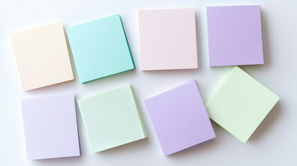 Fototapeta premium A row of colorful sticky notes are arranged in a line