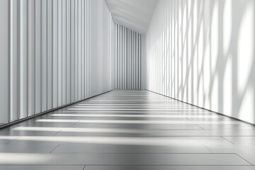 Obraz premium Modern white hallway with sunlit shadows. Ideal for minimalist architecture, design, or serenity concepts.