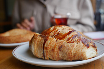 Freshly Baked Croissant on a Plate at Caf